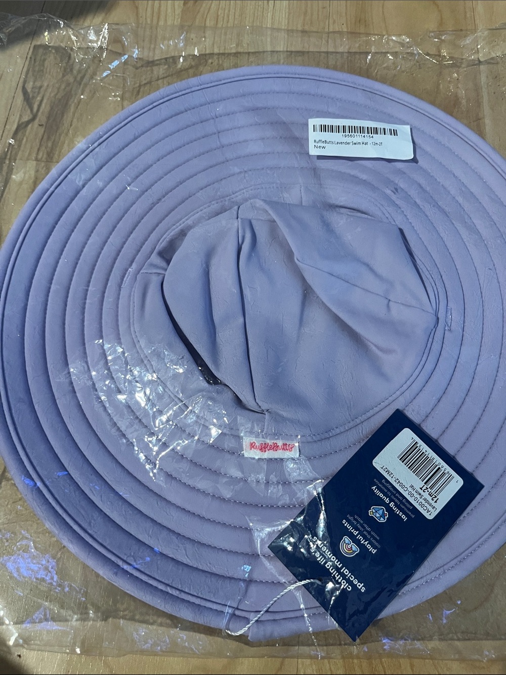 Ruffle butts lavender swim hat UPF 50+